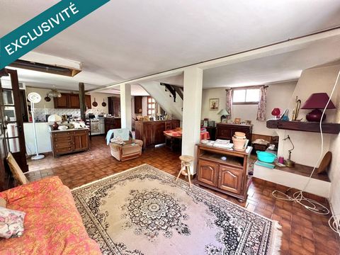 Maison Constituée de 2 appartements avec garage et jardin