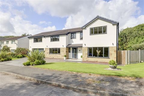An outstanding family home, superbly extended and updated with exceptional contemporary décor. Beautifully presented to a high standard throughout, generous accommodation includes 6 Bedrooms, 3 Bathrooms and 3-4 Reception areas. Set in a highly sough...