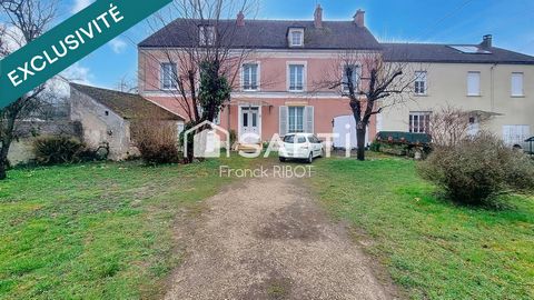 Maison de 205m2 avec jardin, garage, et caractère