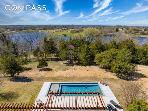 Unveil the splendor of 2451 Marshall Rd., Waxahachie - a haven where elegance intersects with 33 acres of serene landscapes. This exquisite contemporary home is outfitted with the finest Thermador and Viking kitchen appliances, complemented by a Daco...