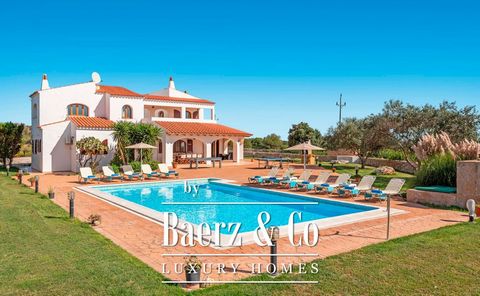 Wonderful property in a privileged location, in the countryside and within walking distance of the sea. This is a two-story Menorcan-style house, built in 2002 with great attention to detail and high-quality materials. The house is designed to be div...