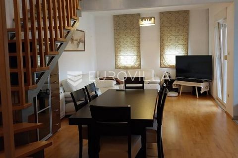 Metković, city center. A beautiful two-story apartment is for sale, located on the second and third floors of a residential building, which consists of an entrance, bathroom, living room and dining room, pantry, kitchen and loggia on the second floor...