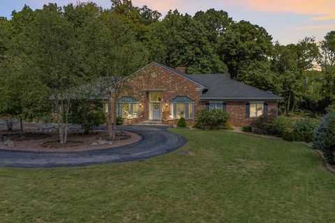 Custom built, all brick ranch home on a beautiful 1.27-acre lot, with mature trees, in the private, gated Hickory Woods Subdivision, the heart of Town and Country! Top-Rated Parkway West – Mason Ridge Elementary! This 4 Bedroom, 7 Bath (4 Full / 3 Ha...