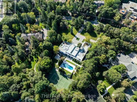 Welcome to an extraordinary private gated modern estate, meticulously remodeled in 2024 and located in the renowned Bridle Path neighborhood. Spanning over 2.1 acres with an impressive 300-foot frontage, this Los Angeles-style residence boasts 17,000...