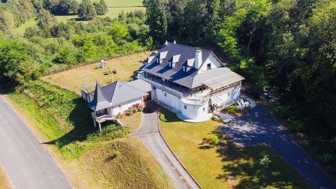 Stunning location offering breathtaking views! This substantial country residence offers upto 600sqm of internal space arranged on three levels, a self-contained and fully modernised annexe and potential to create a gite with unique tower roof and wi...