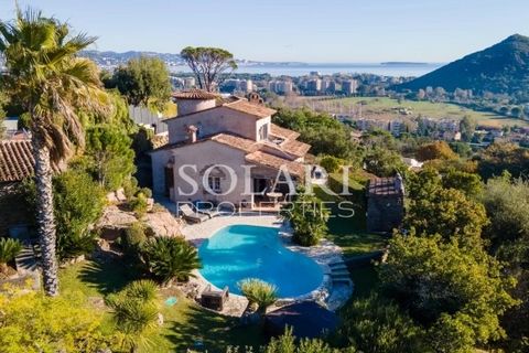 In a sought-after area of Mandelieu-La-Napoule, close to shops and beaches on foot, discover this Provençal farmhouse full of charm and decorated with great taste. Totalising 300sqm spread over 3 levels, the villa opens onto an entrance leading to th...