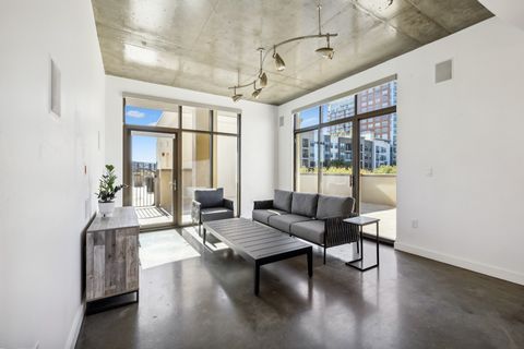 Welcome to the Rhythm, Unit 511! This meticulously renovated corner unit offers 848 square feet of modern living space, featuring one bedroom and one bathroom. The property boasts abundant natural light and a unique 600+ square foot private terrace w...