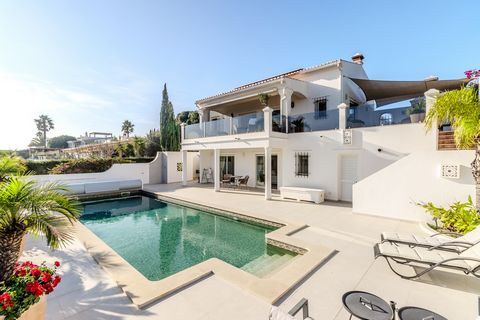 Located on the edge of Praia da Luz, this stunning villa offers unparalleled sea views, a heated pool, and an ideal location for luxury living. As you enter, a welcoming entrance hall leads to a cozy living room with an open fireplace and a bright di...