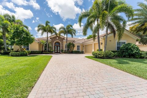 Welcome to 90 SE Ethan Terrace, a stunning 3-bedroom, 4-bathroom plus office residence in the exclusive Stuart community of Tres Belle overlooking a beautiful lake. This 3,431 living sq. ft. home (4,640 Total) offers an unparalleled living experience...