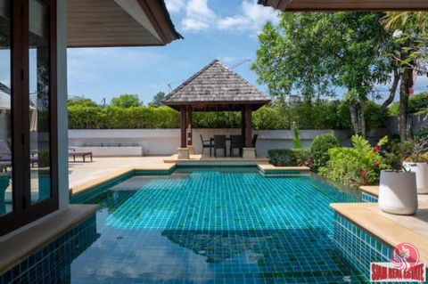 This is a three bedroom, three bath, L-shaped pool villa for sale within walking distance to Bang Tao Beach. The home contains a full western kitchen with a gas stovetop, oven, refrigerator, freezer and dishwasher. There is an open plan living and di...