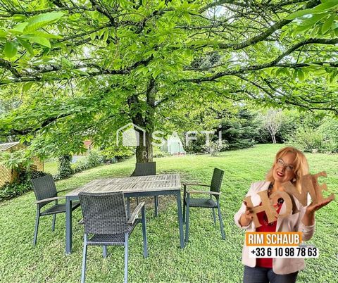 Charmante maison avec grand jardin, fort potentiel d’évolution, idéal pour familles et frontaliers.