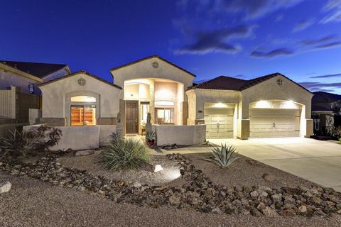 If the Superstition Foothills is your destination, look no further as this furnished home package has it all! Kitchen/great room combination, center island and breakfast bar, breakfast nook, billiard/game room, den/office, large master suite w/double...