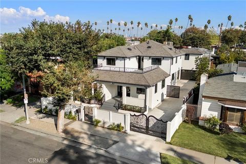 A must-see Park Hills Heights beauty!In the heart of Los Angeles!A beautiful custom home built in 2017.This property is built with entertainment & privacy in mind.This privately gated compound is surrounded by beautiful wrought iron and smooth stucco...