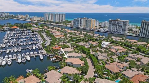 Experience luxury living in Harbor Islands!! This beautiful waterfront home is located in the double gated community of Commodore Estates. Boasting approximately 5000 sq ft of living space including 6 bedrooms, with additional den/office and 4.5 bath...