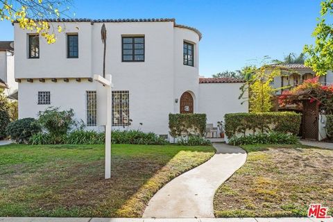 Fabulous Carthay Circle Mediterranean on a 9,500+ s.f. lot! Two story home with lots of character. Living room with fireplace; formal dining room; separate breakfast room; remodeled kitchen w/ stainless steel appliances; 4th bedroom or den and bathro...