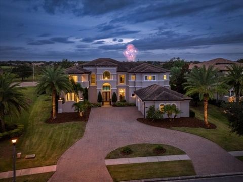 Nice price adjustment on this lovely home. Located on a picturesque lot enveloped by a circular driveway, this exquisite 7,100 sq ft, 6BR, 6BA, 2 half baths Mediterranean-inspired estate home in the highly desired gated community of Casabella embodie...