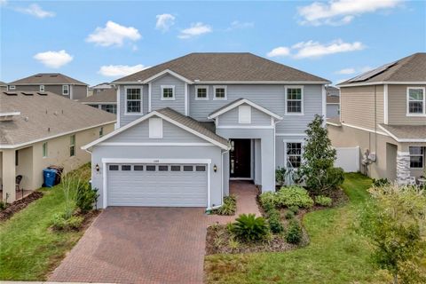 Step inside this charming and spacious 4-bedroom, 3-bathroom home, spanning 2,484 square feet, nestled in the flourishing area of Davenport. Boasting a serene water view of Lake Saint Charles from its welcoming front door, this residence radiates war...