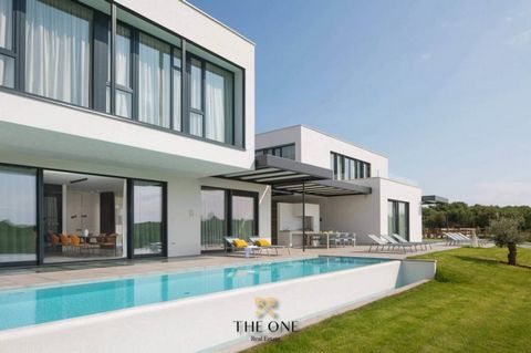 Luxury designer villa in Istria is located in the vicinity of the medieval town of Bale, not far from Rovinj. The villa is a real masterpiece of architecture, conceived as two semi-detached units connected by a hallway and a common spa area. The tota...