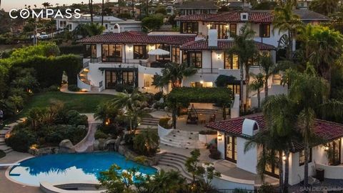 Perched on nearly an acre of land, this Mediterranean-style estate offers stunning ocean, bay, and city skyline views. The property is fully gated and showcases beautiful architecture, with large terraces perfect for taking in the sights from sunrise...