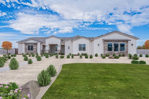 BRAND NEW Construction in an incredible location in Queen Creek! NO HOA - Stunning Modern Farmhouse on a 1 ACRE LOT w/ Horse Privileges. 4 Car Side Entry Garage and Guest Living w/ Seperate Entry. Gourmet Kitchen with high-end Cabinets w/ 42'' uppers...