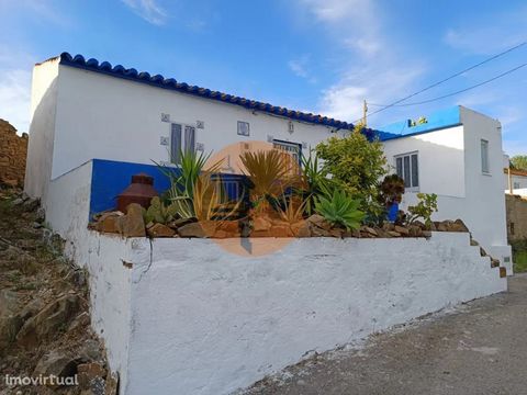 2 bedroom villa in Nora Nova - Odeleite - Castro Marim - Algarve. Typical single-storey house, 2 bedrooms, with outdoor patio. Good access by asphalt. Villa with unobstructed views of the Algarve Mountains. House with terrace. It is 25 minutes from t...