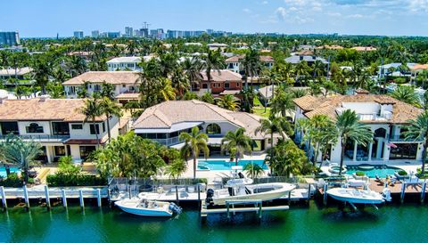 Exceptional Deepwater Estate sited on 100'± of waterfrontage on the wide Flamingo Canal in sought-after Lighthouse Point. This classic estate reveals 4 beds, 4.1 baths & 4,236 Total SqFt. Impressive double height foyer opens to the re-imagined light-...