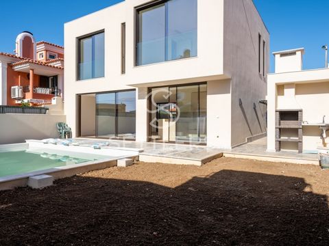 4-bedroom contemporary architecture semi-detached house with 292 m2 of land in Aldeia de Juzo. It is developed on 3 floors as follows: Ground floor: Living room (45.05 m2), facing south, with access to the swimming pool and garden with barbecue, equi...