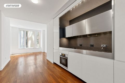 15 William Street #10G Largest one bedroom in the building for the best price. Great central location this contemporary residence features 10 feet ceiling heights, warm Burmese Teak flooring throughout, a built-in home office, washer/dryer, multi-zon...