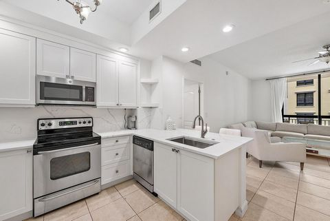 Step into this immaculate oversized 1 Bedroom 1.5 bath unit with 10-foot ceilings in the luxurious One City Plaza in downtown West Palm Beach. Freshly remodeled with a beautiful new kitchen with white cabinets, quartz countertops and gorgeous finishe...