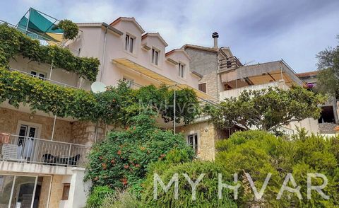 Welcome to your seaside oasis in Ivan Dolac, located on the sunny south side of the island of Hvar, only 400 m². This charming building has four separate apartments, a total of 240 m² of living space, and an additional auxiliary building converted fo...