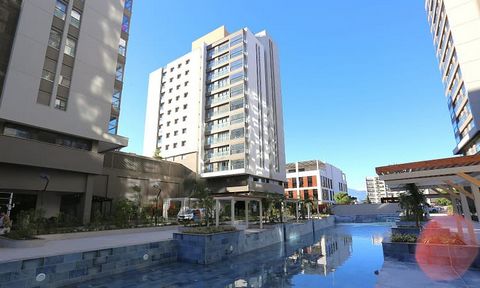 The luxury flats are located in Kepez, Gulveren Neighborhood, Antalya, within a mixed-use complex rich in social facilities. Featuring high ceilings, smart home systems, and underfloor heating, these flats offer a modern and comfortable living experi...