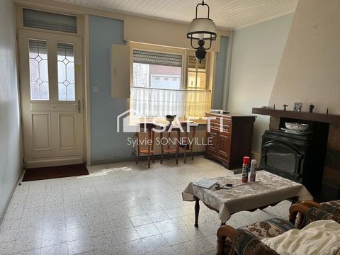 Maison mitoyenne avec garage et jardin