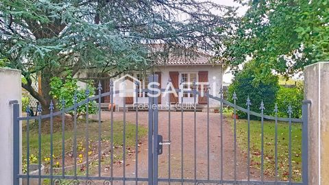 Pavillon idéalement située en cœur de ville sur une vaste parcelle