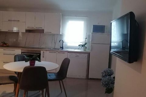 Apartments Villa Jagoda is located on the island of Rab, which is part of the Primorje-Gorski Kotar County in Croatia. Supetarska Draga is renowned for its serene atmosphere, stunning beaches, and rich history, making it an ideal destination for a re...