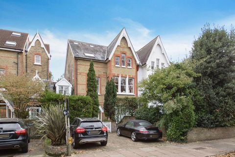 A charming two bedroom, two bathroom conversion flat located on a sought after road in Kew. The property offers a blend of period features with contemporary finishes to create a truly exceptional home. Briefly comprising a principal bedroom with buil...