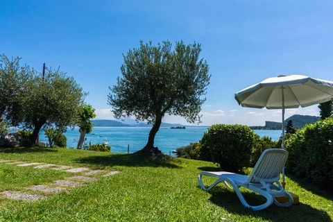 Situated in Manerba del Garda, this spacious apartment offers 2 bedrooms, along with a shared swimming pool, for beating the heat. Ideal for a large family of 6, this property is within walking distance from a gorgeous lake. With a serene atmosphere ...