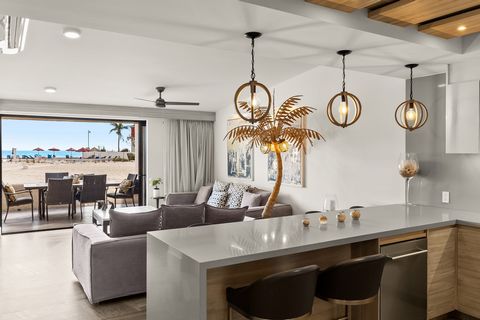 Escape the hustle and unwind in this exquisite oceanfront property, where tranquility meets sophistication. Enjoy the soothing touch of the ocean breeze and the soft sand beneath your feet, immersing yourself in the best Cabo experience. This is an i...