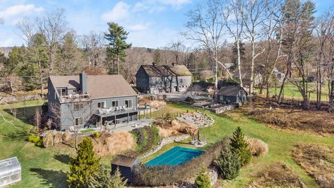MEADOWCROFT, a spectacular European-inspired custom built chalet sited on a breathtaking, 3.7 acre piece of property with antique outbuildings including a 200 year old dairy barn. This is the perfect marriage of modern and antique. The main house boa...