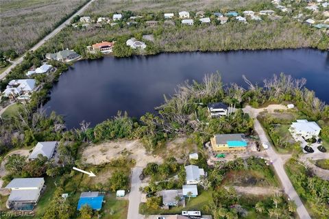 It's the perfect time to build your dream home on Sanibel Island! This neighborhood is just a short walk or bike ride to restaurants, shopping beaches and bike paths. No deed restrictions! Boat in yard does not convey.