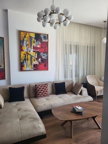 Great apartment of 137 m2 is distributed in two apartments with main entrance together, a large holl with wooden furniture and pictures, green plants. Features: - Balcony
