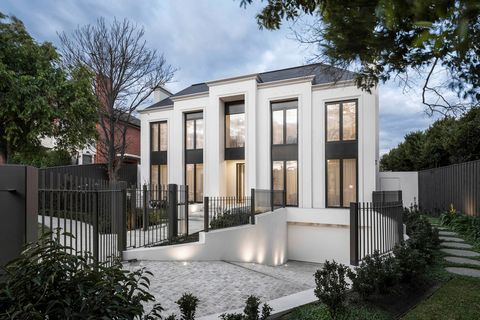 Designed by Nicholas Day, this magnificent, newly-built residence artfully combines sumptuously-spacious family living with alluring entertaining spaces, all set in an exclusive cul-de-sac close to Toorak village and elite schooling. Entering through...