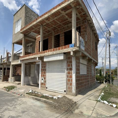 Corner house for sale located in Manzanares de Ciudad Del Valle sector 6 located on the Cali - Candelaria road, this property has a structure and advanced for the construction of 4 floors, it is distributed in 2 independent floors, it has iron and pr...