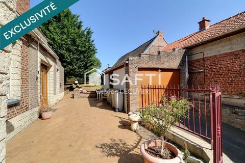Maison individuelle d'environ 100 m2, grand jardin, garage et atelier. Potentiel 4 chambres.