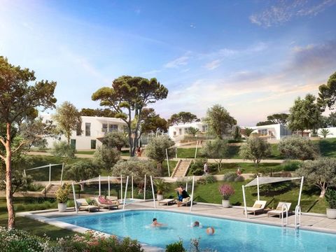 Property for sale in the Lavandou Like a fleet of white catamarans anchored on verdant land, the six small buildings, armed with their sailcloth sun visors, dominate the bay. The underground car parks free up the wooded common areas, where the blue r...