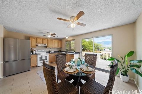 Nestled in the lovely Lualualei neighborhood, in wonderful Waianae, this grand 5 bedroom, 3 bathroom home, welcomes you to a verbose and spacious 7,899 corner lot. The 27 useful, Leased, Sunrun Photovoltaic panels that help reduce electric bills, wil...