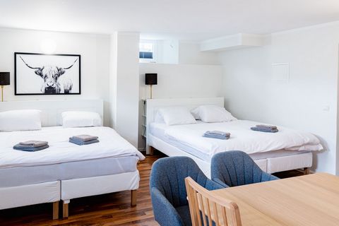 Welcome to our modern apartment at Rostock Central Station! This accommodation offers space for 8 people and has newly furnished rooms, each with two comfortable king size beds, a small kitchen, a modern bathroom and Wi-Fi and TV in each bedroom. Enj...