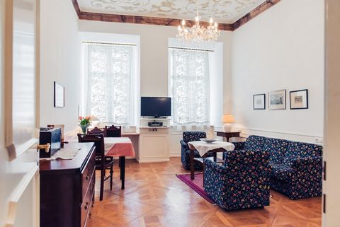 The apartment is on the 2nd floor of a well-kept baroque house in a quiet side street in the city center. The apartment has partial underfloor heating, stylish furniture, marble, tiled and parquet floors. The living room/bedroom has historical ceilin...