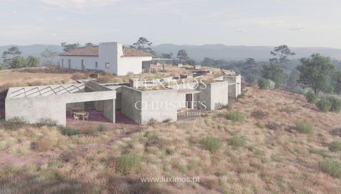 Between the hills of the Aljezur area, there is this fantastic 23.55 ha plot of land . It represents a unique opportunity to invest and develop this project approved for Local Accommodation , for rural tourism. With a building area of 500 m², this pr...