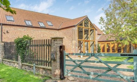 Welcome to Ashtree Barn, a stunning and spacious three-bedroom barn conversion, exuding character and charm at every turn. As you enter this handsome property, you are be greeted with an impressive floor to ceiling glass entrance, leading into the sp...