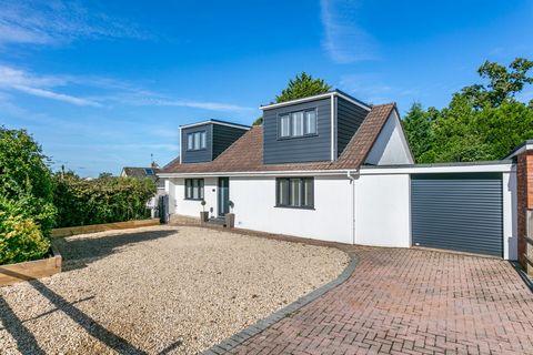 As soon as you open the front door you are greeted with a spacious, double height entrance hallway with a galleried landing, setting the tone for the rest of the property. The heart of this home is a generously sized open-plan kitchen and dining area...